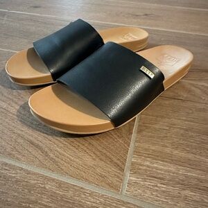 Reef Black and Tan Slide Sandals